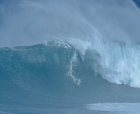 Sport photography. Jaws swell on International surfing event in Maui, Hawai 2021 December.のeditorial素材