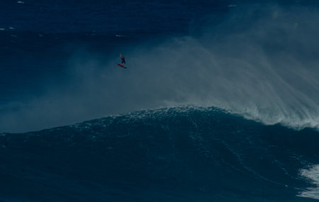 Sport photography. Jaws swell on International surfing event in Maui, Hawai 2021 December.のeditorial素材
