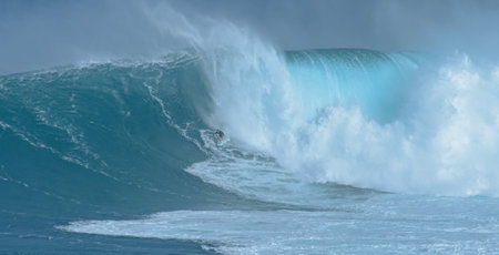 Sport photography. Jaws swell on International surfing event in Maui, Hawai 2021 December.のeditorial素材