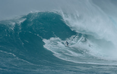 Sport photography. Jaws swell on International surfing event in Maui, Hawai 2021 December.のeditorial素材
