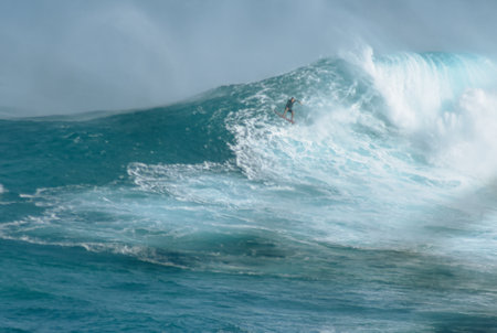 Sport photography. Jaws swell on International surfing event in Maui, Hawai 2021 December.のeditorial素材
