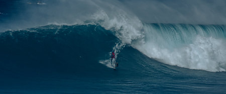Sport photography. Jaws swell on International surfing event in Maui, Hawai 2021 December.のeditorial素材