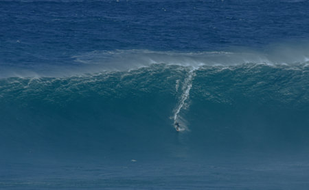Sport photography. Jaws swell on International surfing event in Maui, Hawai 2021 December.のeditorial素材