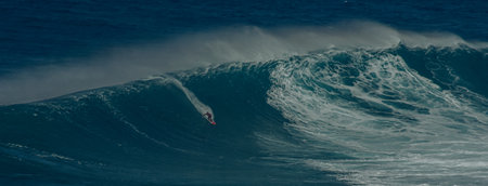 Sport photography. Jaws swell on International surfing event in Maui, Hawai 2021 December.のeditorial素材