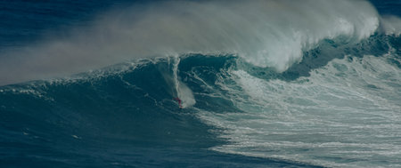 Sport photography. Jaws swell on International surfing event in Maui, Hawai 2021 December.のeditorial素材