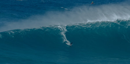 Sport photography. Jaws swell on International surfing event in Maui, Hawai 2021 December.のeditorial素材