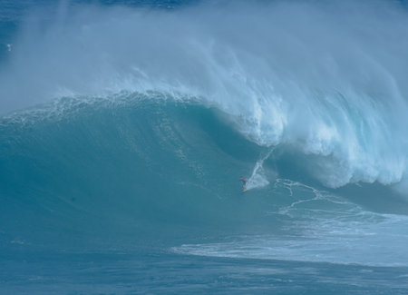 Sport photography. Jaws swell on International surfing event in Maui, Hawai 2021 December.のeditorial素材