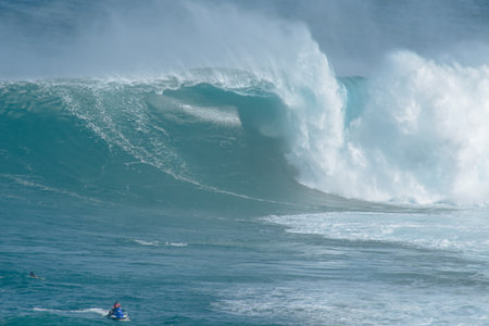 Sport photography. Jaws swell on International surfing event in Maui, Hawai 2021 December.のeditorial素材