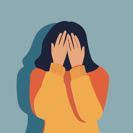 Illustration of a woman with dark hair covering her face with her hands, expressing sadness or despair.のイラスト素材
