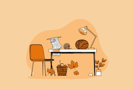 A warm illustration featuring a knitting project on a desk, surrounded by yarn, a lamp, and autumn leaves, creating a cozy atmosphere.のイラスト素材