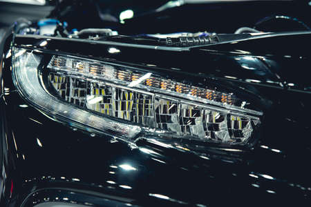 Headlight of a modern luxury car, auto detail,car care concept ,daytime running lightの写真素材