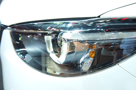 Headlight of a modern luxury car, auto detail,car care concept ,daytime running light