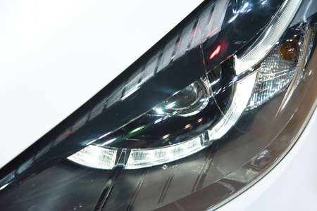 Headlight of a modern luxury car, auto detail,car care conceptの写真素材