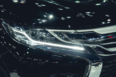 Headlight of a modern luxury car, auto detail,car care concept ,daytime running lightの写真素材