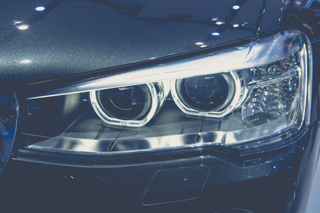 Closeup headlights of car,modern car xenon lamp headlight,luxury carの写真素材