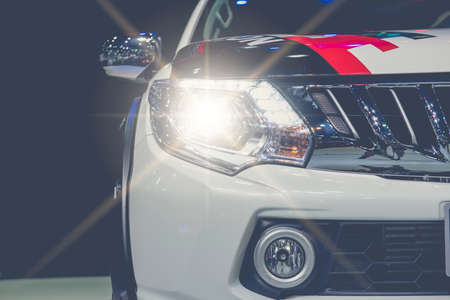 Closeup headlights of car,modern car xenon lamp headlight,luxury car.の写真素材