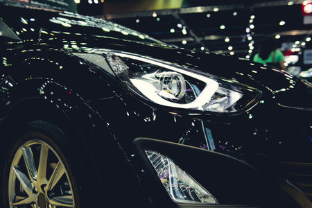 Closeup headlights of car,modern car xenon lamp headlight,luxury car.