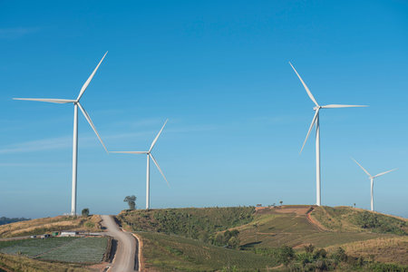 Wind turbines on a mountain high background
