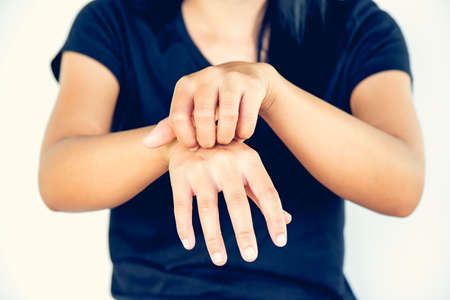 Scratch the itch of allergy, rashの写真素材