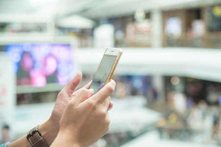 Woman apply mobile phone ,businesswomanの写真素材