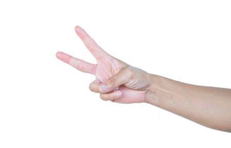 A young man' hand is displaying a thumbs upの写真素材
