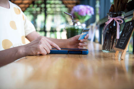 Woman using mobile online banking and make payment, ,mobile banking network,online paymentの写真素材