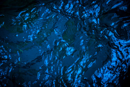 Water waves with shining texture background.