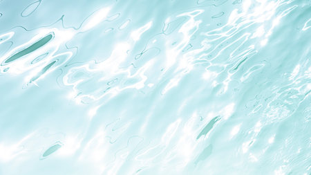 Water in swimming pool rippled water detail background and light refracting .の写真素材