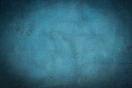 Rough cemente studio background, empty cyan cement for backdrop ,poster ,banner or interior design.の写真素材