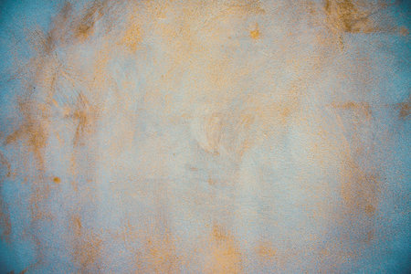 Rough cemente studio background, empty cyan cement for backdrop ,poster ,banner or interior design.の写真素材