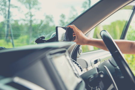 Equip mobile phone with map gps navigation in car before a trip or journey.の写真素材