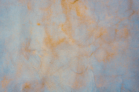 Abstract orange and light blue gradient paint grunge texture background.の写真素材