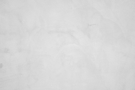 Grey concrete wall cracks which can be used as a background.の写真素材