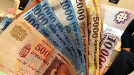 Close up view of the banknotes of various denominations in a shopの写真素材