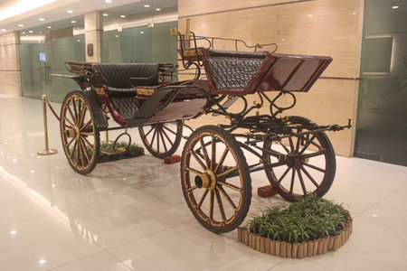 Horse-drawn carriage in the interior of the modern building.の写真素材