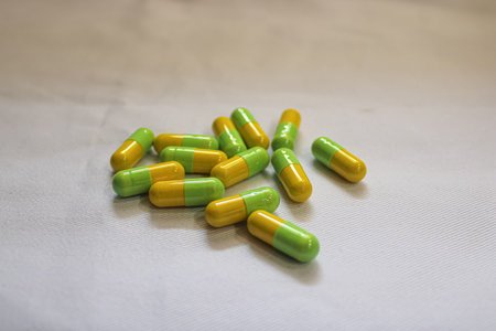 Scattered capsules on a white backgroundの写真素材