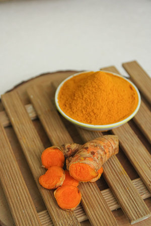 Turmeric roots and turmeric powder - Curcuma longa