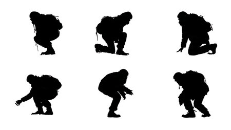 Hunter Crouching Low and Stalking Prey Silhouette Set isolated on plain white background.のイラスト素材