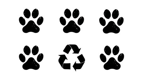 Eco-Friendly Recycling Symbol with Paw Print Silhouette isolated on plain white background.のイラスト素材