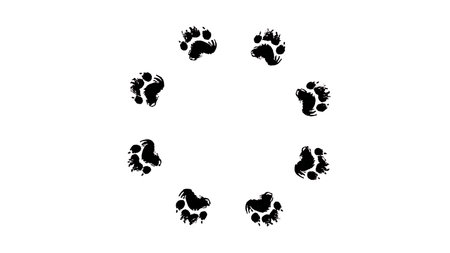 Paw Print Circular Frame and Border Silhouette Set isolated on plain white background.のイラスト素材