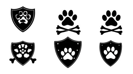 Pirate Paw Print Shield and Bones Silhouette isolated on plain white background.のイラスト素材