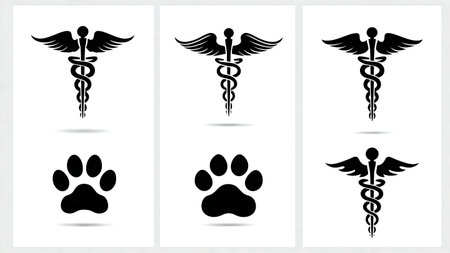 Veterinary Caduceus with Paw Print Silhouette Symbol isolated on plain white background.のイラスト素材