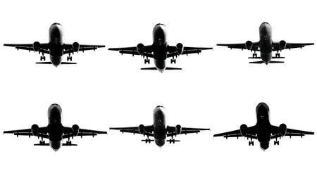 Commercial Airliner with Landing Gear Down Silhouette Set isolated on plain white background.のイラスト素材