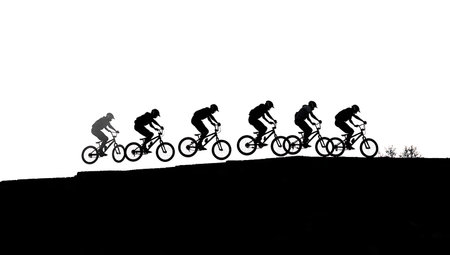 BMX Sprocket Stall Balance Trick Silhouettes isolated on plain white background.