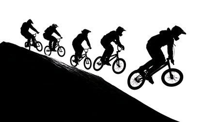 BMX Rider Launching from Quarter Pipe Ramp Silhouettes isolated on plain white background.のイラスト素材