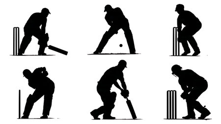 Bowler Breaking Stumps (Bowled) Action Silhouettes isolated on plain white background.