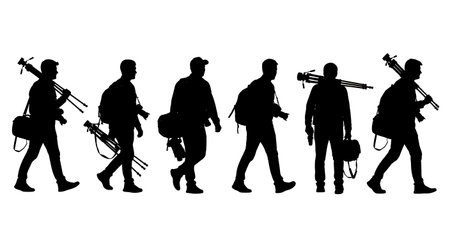 Black Solid Walking Photographer Silhouettes Set of Six on White Background isolated on plain white...
