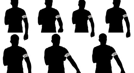 Football Captain Adjusting Armband Silhouettes isolated on plain white background.のイラスト素材