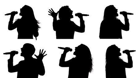Black Solid Singer Two Hands Mic Silhouettes Set of Six on White Background isolated on plain white background.のイラスト素材
