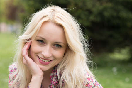 cute blond girl smilingの写真素材
